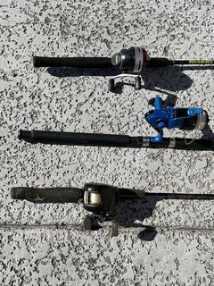 Three Fishing Rods and Reels ready to go